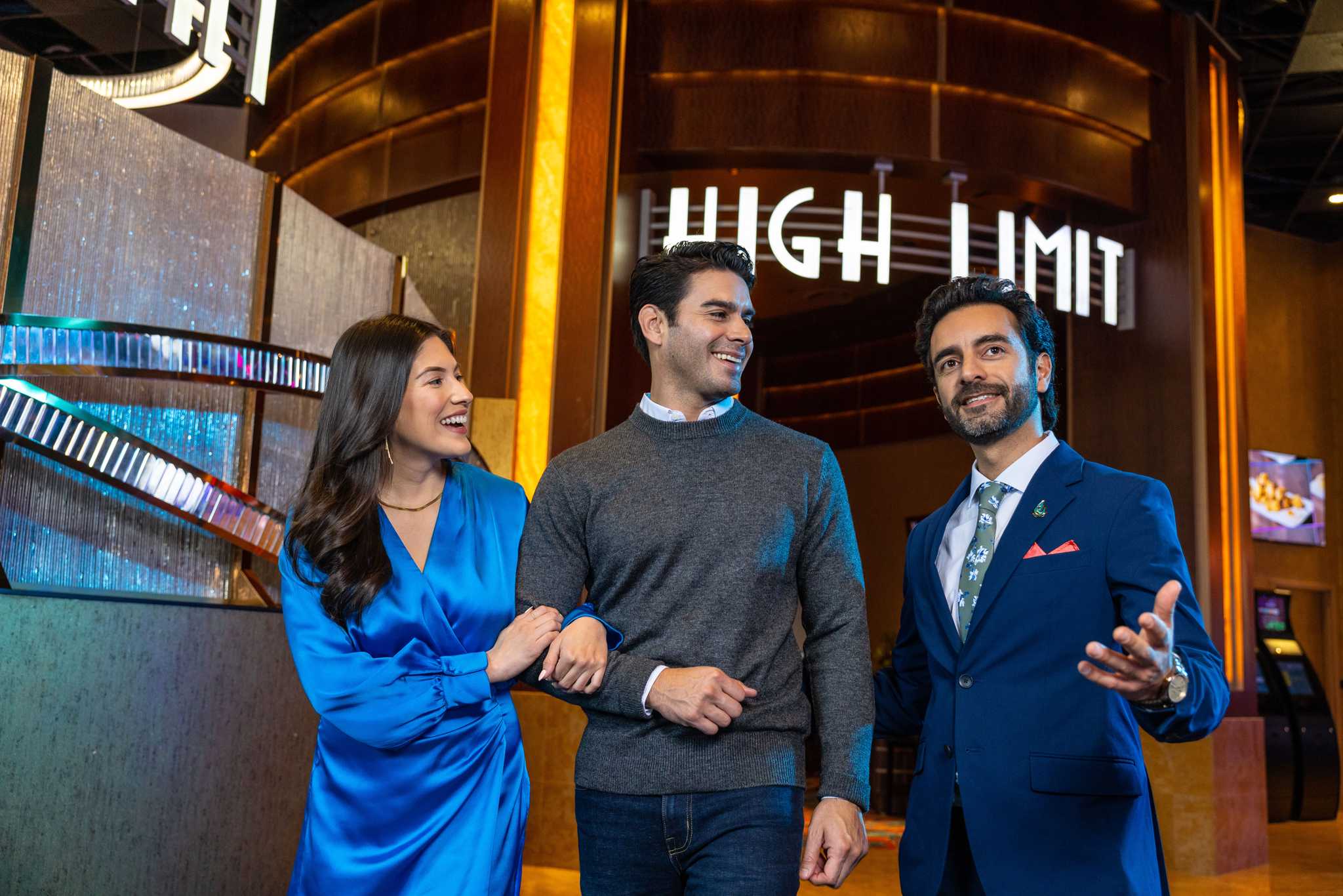 Three people in front f the High Limit area of the Jamul Casino Resort in San Diego.